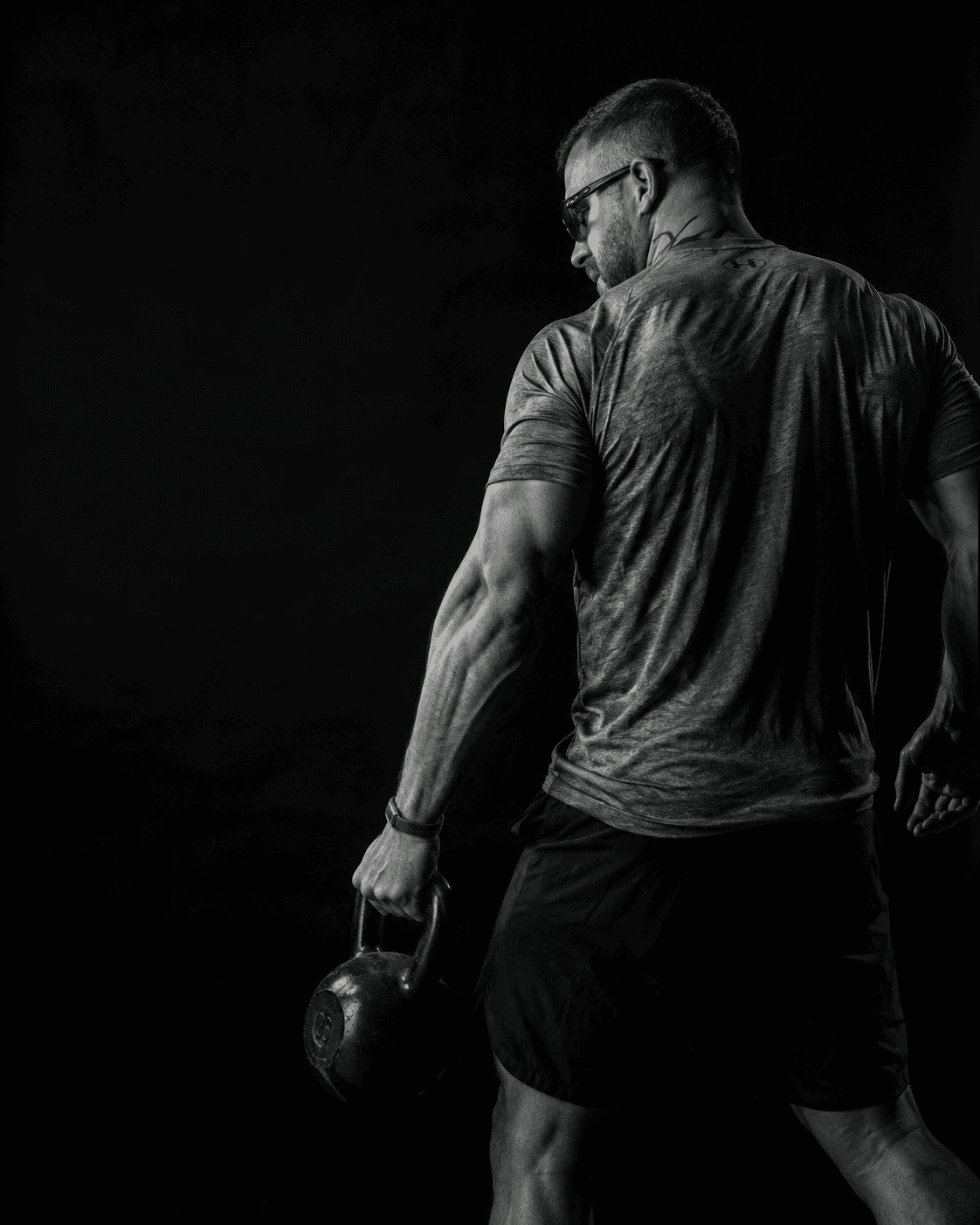 Guillaume en plein effort, kettlebell en main